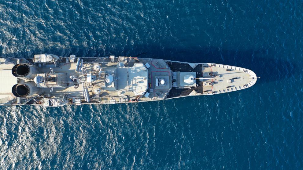 Image of a navy ship from above. 