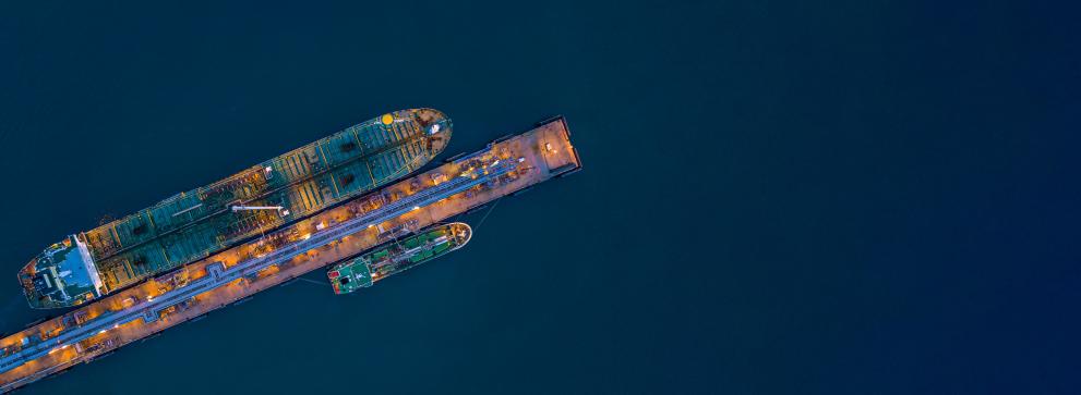 Ariel view  tanker ship loading in port at night, 